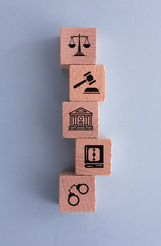 Wooden,Block,Cube,Shape,With,Icon,Law,Legal,Justice. Wood block with legal icons on them